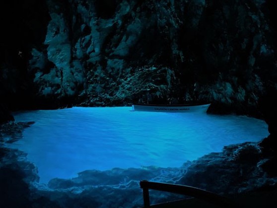 Light reflection in a cave filled with Adriatic Sea water glows blue