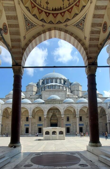 courtyard entrance to a marble mosque in Istanbul